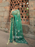 MANN MOHINI - Emerald Green Organza Mukaish Pearl Saree (The blouse shown is for styling purposes only)